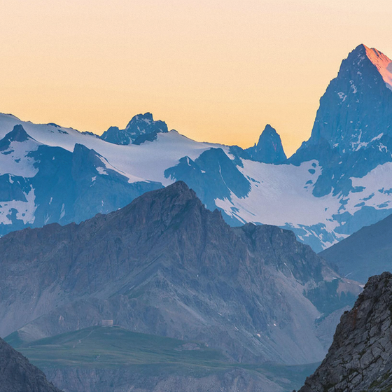 Sunset over a mountain peak wall mural